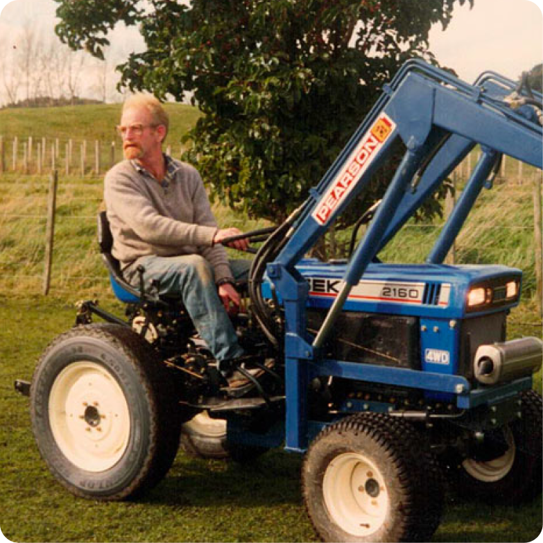 A member of the family on a farm tractor